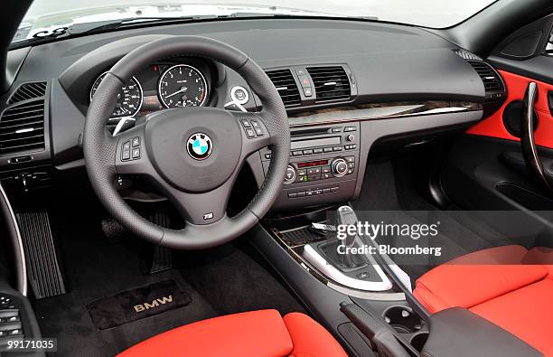 The interior of a 2011 BMW 135i convertible is displayed in Millville, New Jersey, U.S., on Wednesday, May 12, 2010. Bayerische Motoren Werke AG, the...