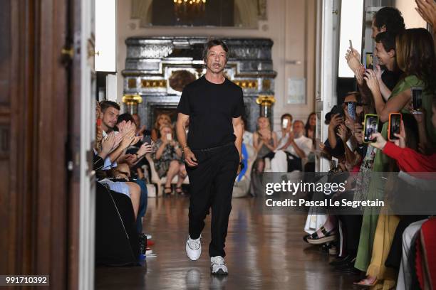 Pierpaolo Piccioli is applauded on the runway during the Valentino Haute Couture Fall Winter 2018/2019 show as part of Paris Fashion Week on July 4,...