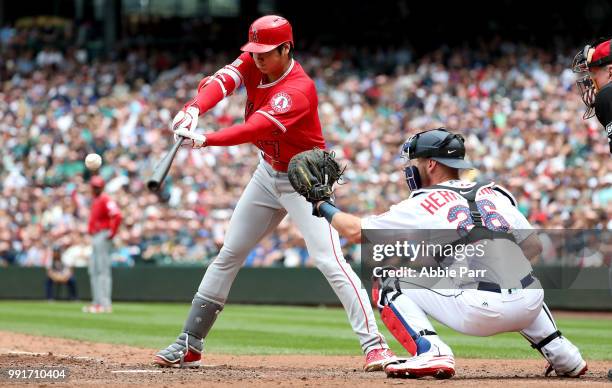 Shohei Ohtani of the Los Angeles Angels of Anaheim flies out to left field in the fifth inning against the Seattle Mariners during their game at...