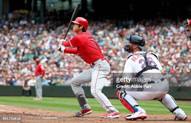 Shohei Ohtani of the Los Angeles Angels of Anaheim flies out to left field in the fifth inning against the Seattle Mariners during their game at...