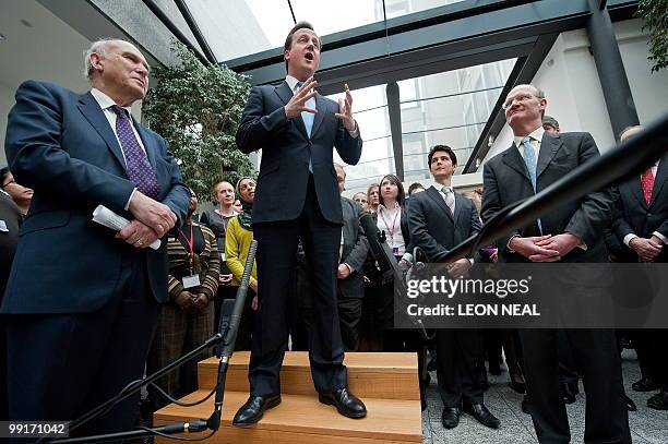 Britain's new Liberal Democrat Business Secretary, Vince Cable , and Conservative Minister of State for Universities and Science, David Willets...