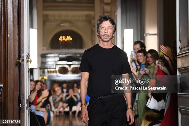 Pierpaolo Piccioli is applauded on the runway during the Valentino Haute Couture Fall Winter 2018/2019 show as part of Paris Fashion Week on July 4,...