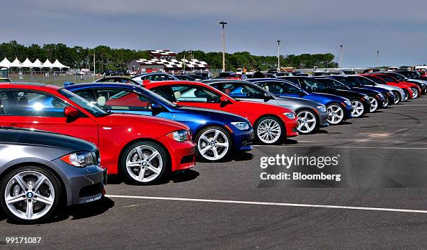 Vehicles are lined up before being driven at New Jersey Motorsport Park in Millville, New Jersey, U.S., on Tuesday, May 11, 2010. Bayerische Motoren...