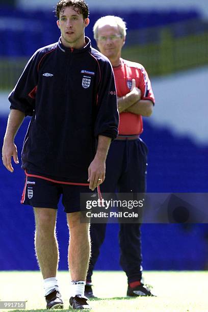 Robbie Fowler of the England squad is watched by England coach Sven Goran Eriksson during training at White Hart Lane, London. DIGITAL IMAGE...