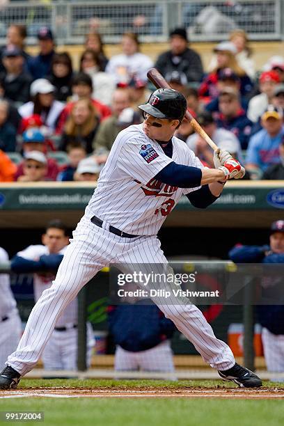 Justin Morneau of the Minnesota Twins bats against the Baltimore Orioles at Target Field on May 8, 2010 in Minneapolis, Minnesota. The Orioles beat...