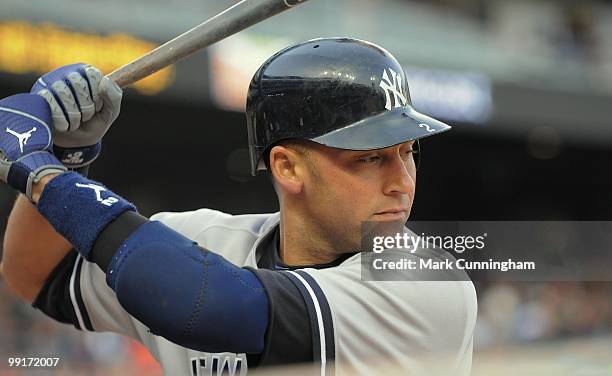 Derek Jeter of the New York Yankees looks on from the on-deck circle against the Detroit Tigers during the game at Comerica Park on May 10, 2010 in...