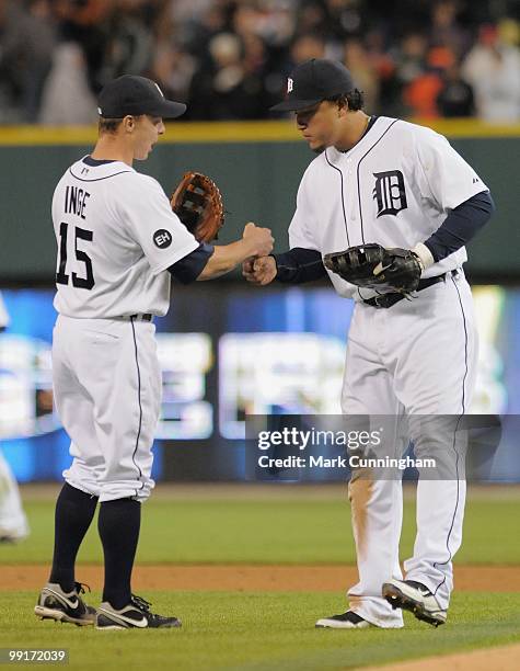 Brandon Inge and Miguel Cabrera of the Detroit Tigers celebrate the victory against the New York Yankees at Comerica Park on May 10, 2010 in Detroit,...