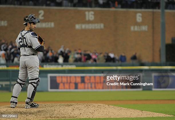 Jorge Posada of the New York Yankees looks on from the pitchers mound against the Detroit Tigers during the game at Comerica Park on May 10, 2010 in...