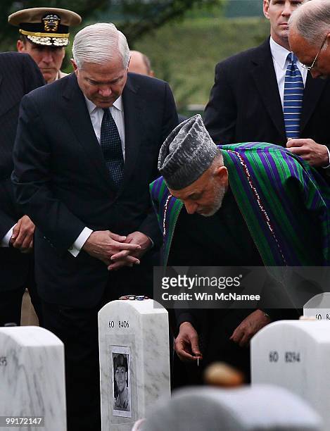 During a tour of Section 60 at Arlington National Cemetery with U.S. Secretary of Defense Robert Gates , Afghanistan President Hamid Karzai visit the...