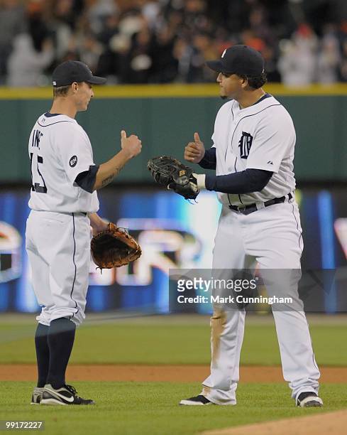 Brandon Inge and Miguel Cabrera of the Detroit Tigers celebrate the victory against the New York Yankees at Comerica Park on May 10, 2010 in Detroit,...