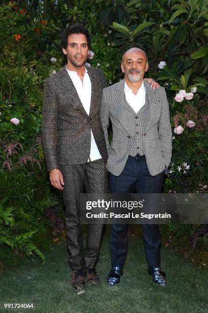 Mika and Christian Louboutin attend the Valentino Haute Couture Fall Winter 2018/2019 show as part of Paris Fashion Week on July 4, 2018 in Paris,...