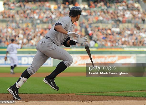 Alex Rodriguez of the New York Yankees runs to first base against the Detroit Tigers during the game at Comerica Park on May 10, 2010 in Detroit,...