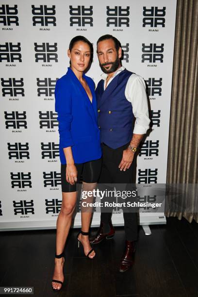 Rebecca Mir and Massimo Sinato attends the Riani after show party during the Berlin Fashion Week Spring/Summer 2019 at Grace Hotel Zoo on July 4,...