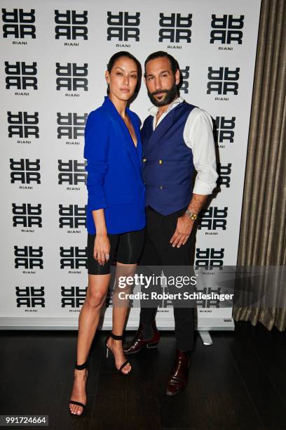 Rebecca Mir and Massimo Sinato attends the Riani after show party during the Berlin Fashion Week Spring/Summer 2019 at Grace Hotel Zoo on July 4,...