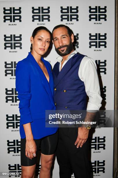 Rebecca Mir and Massimo Sinato attends the Riani after show party during the Berlin Fashion Week Spring/Summer 2019 at Grace Hotel Zoo on July 4,...