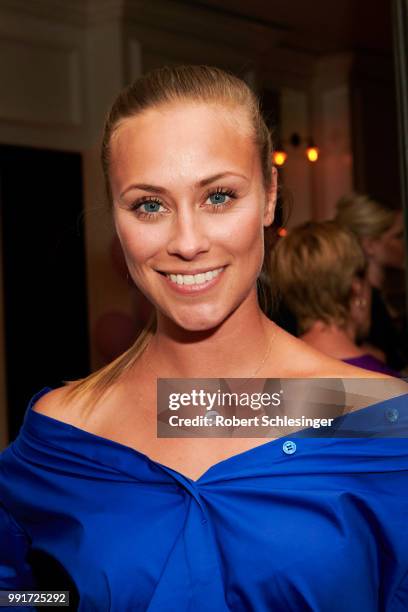 Sina Tkotsch attends the Riani after show party during the Berlin Fashion Week Spring/Summer 2019 at Grace Hotel Zoo on July 4, 2018 in Berlin,...