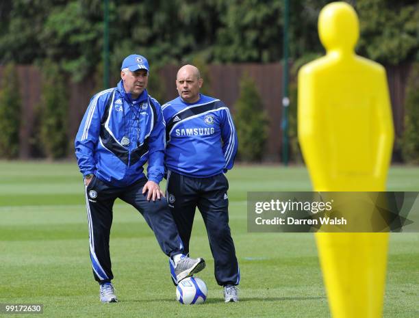 Chelsea manager Carlo Ancelotti and Ray Wilkins during a training session at the Cobham Training ground on May 13, 2010 in Cobham, England.
