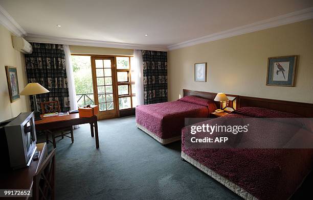 This picture taken on April 16, 2010 shows a bedroom at the Indaba Hotel in Johannesburg. The Indaba Hotel will be the base camp for Honduras'...