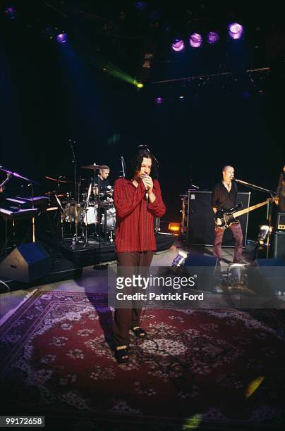 Australian singer Michael Hutchence in concert with INXS, 1997.