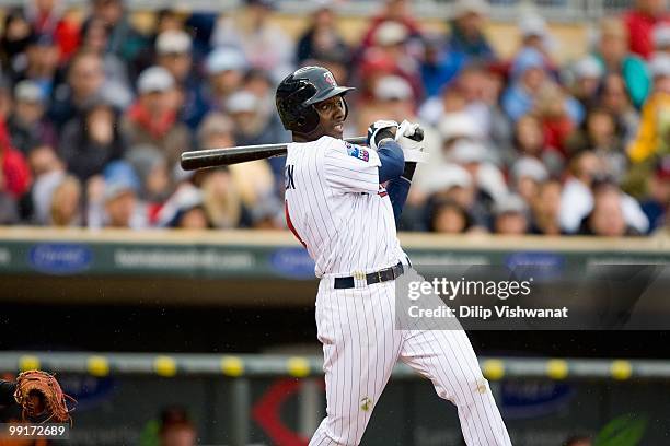 Orlando Hudson of the Minnesota Twins throws to first base against the Baltimore Orioles at Target Field on May 8, 2010 in Minneapolis, Minnesota....