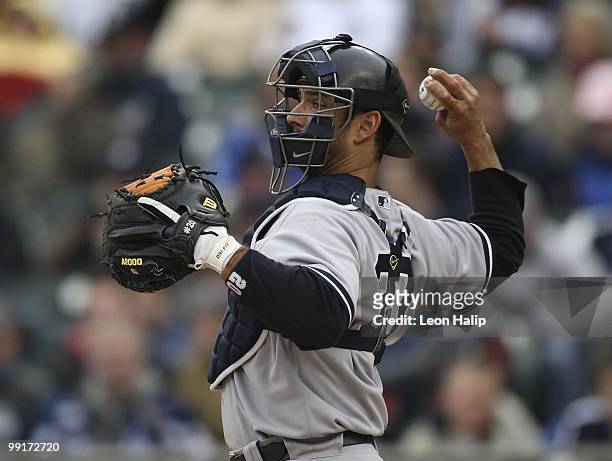 Jorge Posada of the New York Yankees throws the ball to third base during the game against the Detroit Tigers on May 12, 2010 at Comerica Park in...