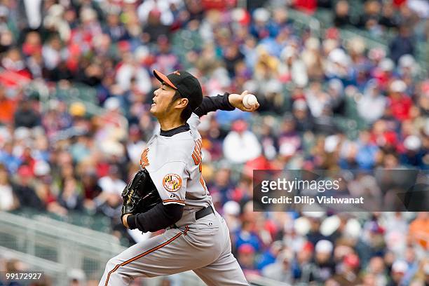 Relief pitcher Koji Uehara of the Baltimore Orioles throws against the Minnesota Twins at Target Field on May 8, 2010 in Minneapolis, Minnesota. The...