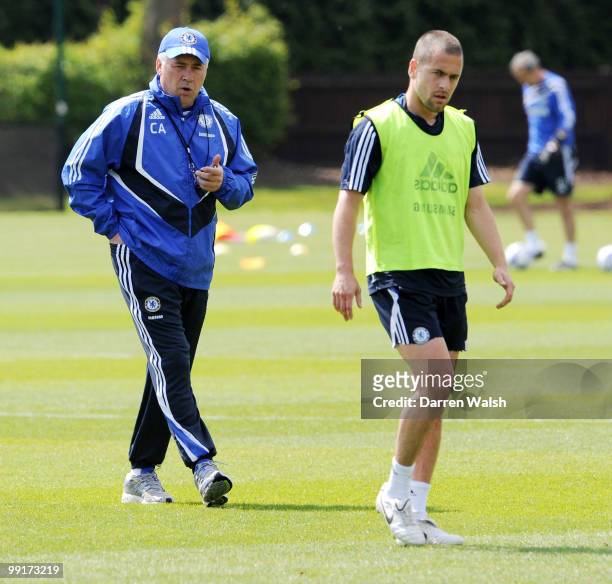 Chelsea manager Carlo Ancelotti and Joe Cole during a training session at the Cobham training ground on May 13, 2010 in Cobham, England.