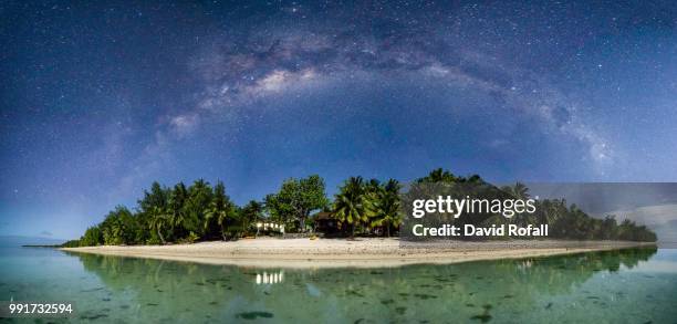 milky way over aitutaki - vanuatu stock pictures, royalty-free photos & images