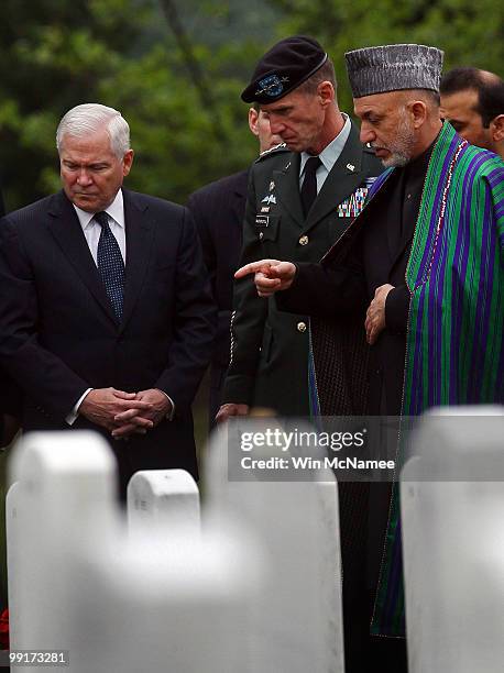 Afghanistan President Hamid Karzai visits Section 60 of Arlington National Cemetery with Commander U.S. Forces Afghanistan, Army Gen. Stanley...