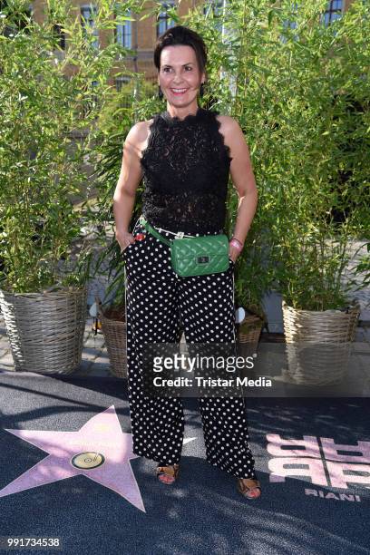 Astrid Rudolph attends the Riani show during the Berlin Fashion Week Spring/Summer 2019 at ewerk on July 4, 2018 in Berlin, Germany.