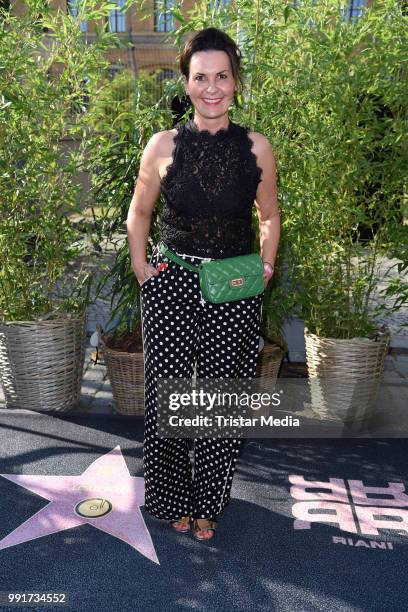 Astrid Rudolph attends the Riani show during the Berlin Fashion Week Spring/Summer 2019 at ewerk on July 4, 2018 in Berlin, Germany.