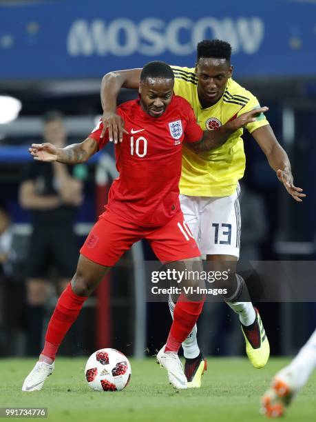 Raheem Sterling of England, Yerry Mina of Colombia during the 2018 FIFA World Cup Russia round of 16 match between Columbia and England at the...