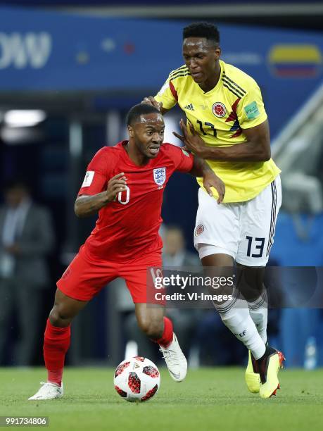 Raheem Sterling of England, Yerry Mina of Colombia during the 2018 FIFA World Cup Russia round of 16 match between Columbia and England at the...
