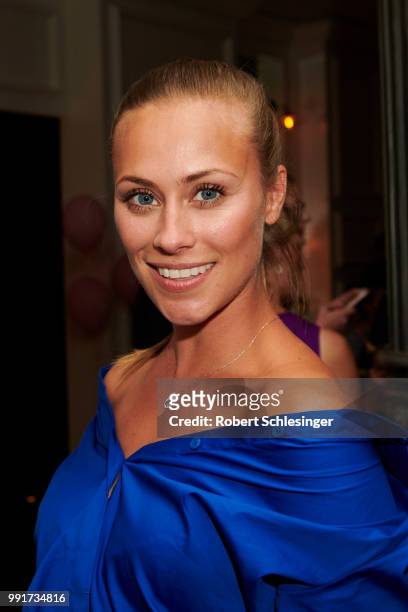 Sina Tkotsch attends the Riani after show party during the Berlin Fashion Week Spring/Summer 2019 at Grace Hotel Zoo on July 4, 2018 in Berlin,...