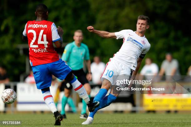 Stefano Denswil of Club Brugge, Florin Tanase of Steaua Bucharest during the Club Friendly match between Club Brugge v Steaua Bucharest at the...