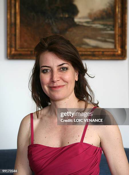 Italian director Sabina Guzzanti poses as she presents her film "Draquila - L'Italia Che Trema" as part of a special screening at the 63rd Cannes...