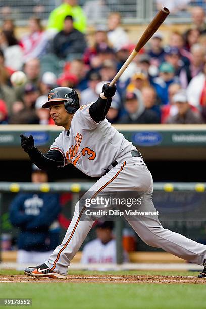 Cesar Izturis of the Baltimore Orioles bats against the Minnesota Twins at Target Field on May 8, 2010 in Minneapolis, Minnesota. The Orioles beat...