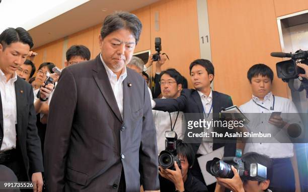 Education Minister Yoshimasa Hayashi leaves after speaks to media reporters after a senior official Futoshi Sano was arrested by Tokyo Prosecutors...