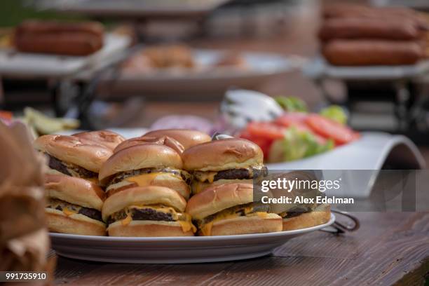 Cheeseburgers are seen during a picnic for military families hosted by President Donald Trump and first lady Melania Trump at the White House on July...