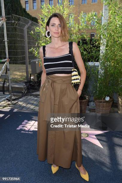 Eva Padberg attends the Riani show during the Berlin Fashion Week Spring/Summer 2019 at ewerk on July 4, 2018 in Berlin, Germany..