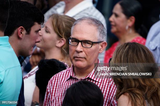 Environmental Protection Agency Administrator Scott Pruitt listens while US President Donald Trump speaks during an Independence Day picnic for...