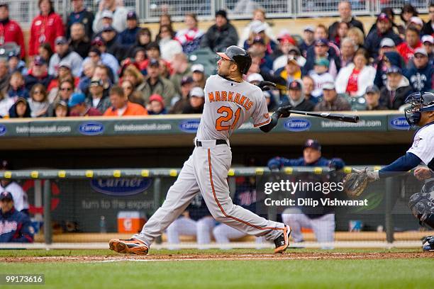 Nick Markakis of the Baltimore Orioles bats against the Minnesota Twins at Target Field on May 8, 2010 in Minneapolis, Minnesota. The Orioles beat...