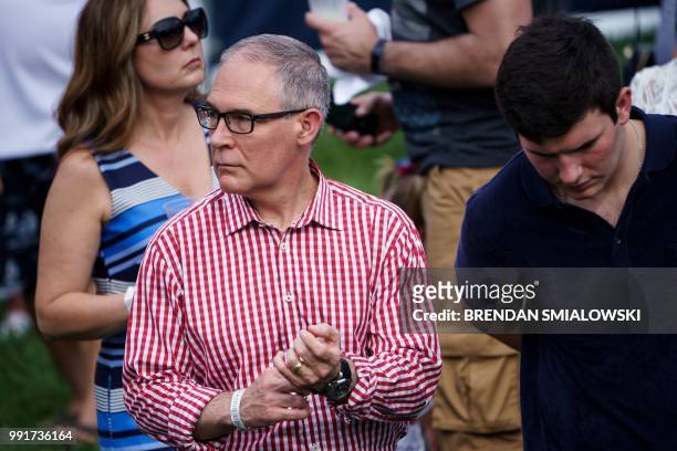 Environmental Protection Agency Administrator Scott Pruitt , leaves with his wife Marlyn Pruitt and son Scott Pruitt during an Independence Day...