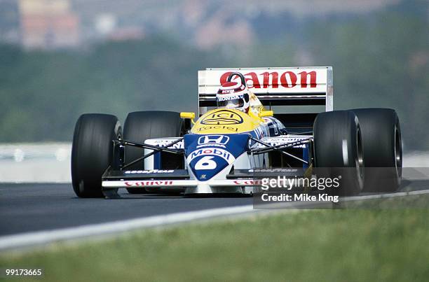 Nelson Piquet, drives the Canon Williams Honda Williams FW11B during the Grand Prix of Hungary on 10 August 1986 at the Hungaroring Circuit,...