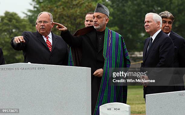 Afghanistan President Hamid Karzai visits Section 60 at Arlington National Cemetery with U.S. Secretary of Defense Robert Gates and cemetery...