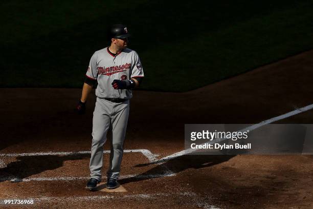 Brian Dozier of the Minnesota Twins scores a run in the seventh inning against the Milwaukee Brewers at Miller Park on July 4, 2018 in Milwaukee,...