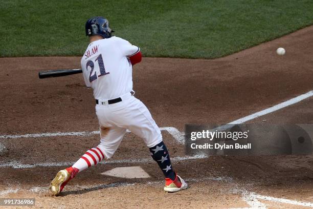 Travis Shaw of the Milwaukee Brewers pops out in the sixth inning against the Minnesota Twins at Miller Park on July 4, 2018 in Milwaukee, Wisconsin.