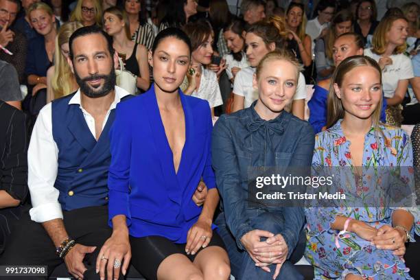 Rebecca Mir, her husband Massimo Sinato, Anna Maria Muehe and Sonja Gerhardt attend the Riani show during the Berlin Fashion Week Spring/Summer 2019...