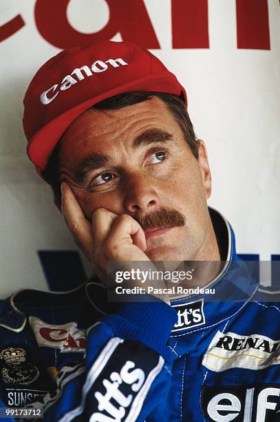 Nigel Mansell, driver of the Canon Williams Renault Williams FW14 Renault during practice for the Japanese Grand Prix on 19 October 1991at the Suzuka...