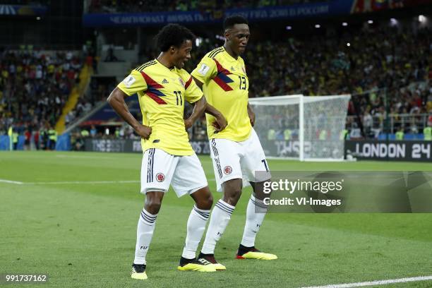 Juan Cuadrado of Colombia, Yerry Mina of Colombia during the 2018 FIFA World Cup Russia round of 16 match between Columbia and England at the Spartak...